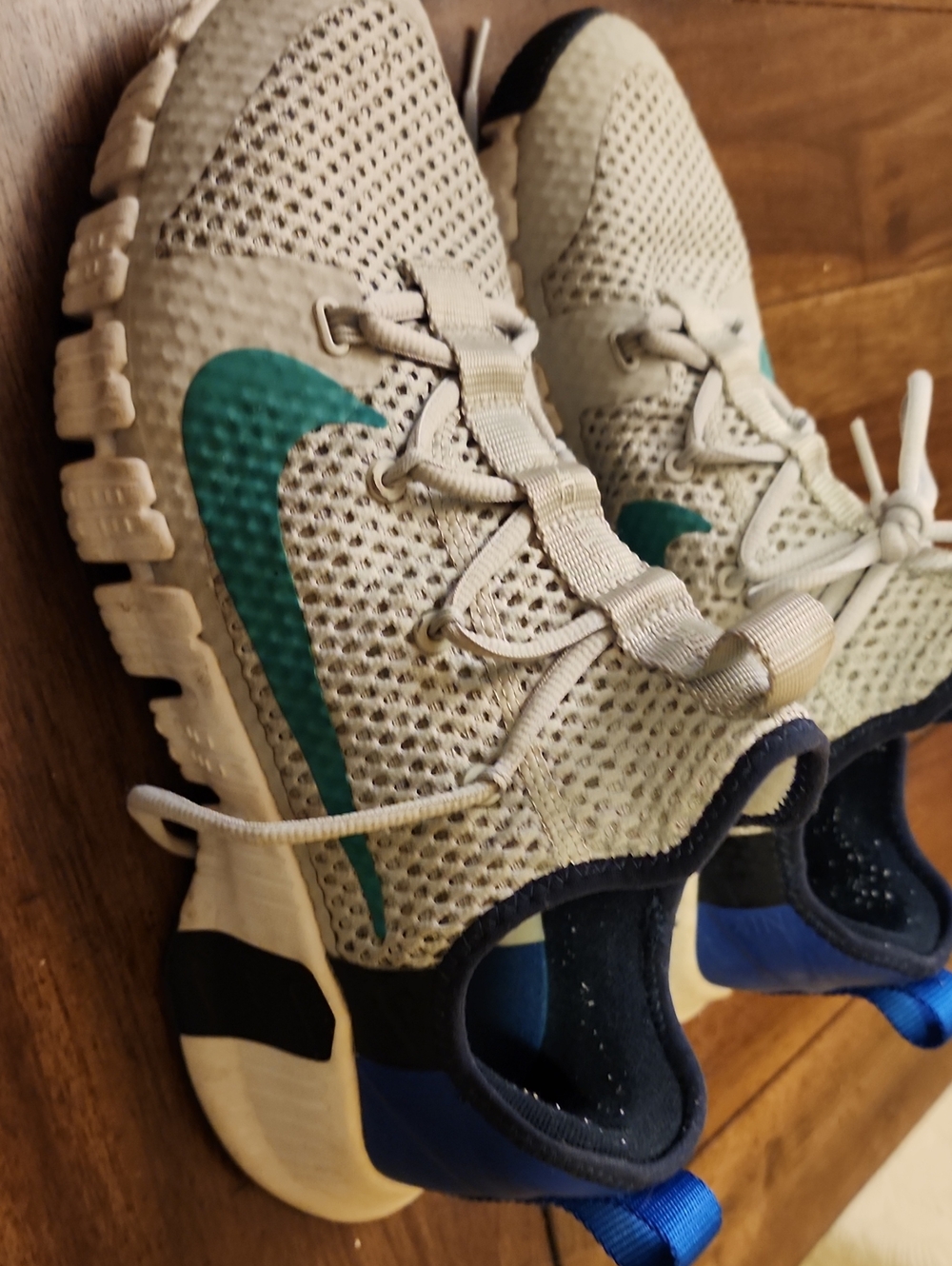 Nike Men's Beige Knit Sneakers with Teal Swoosh and Blue Heel